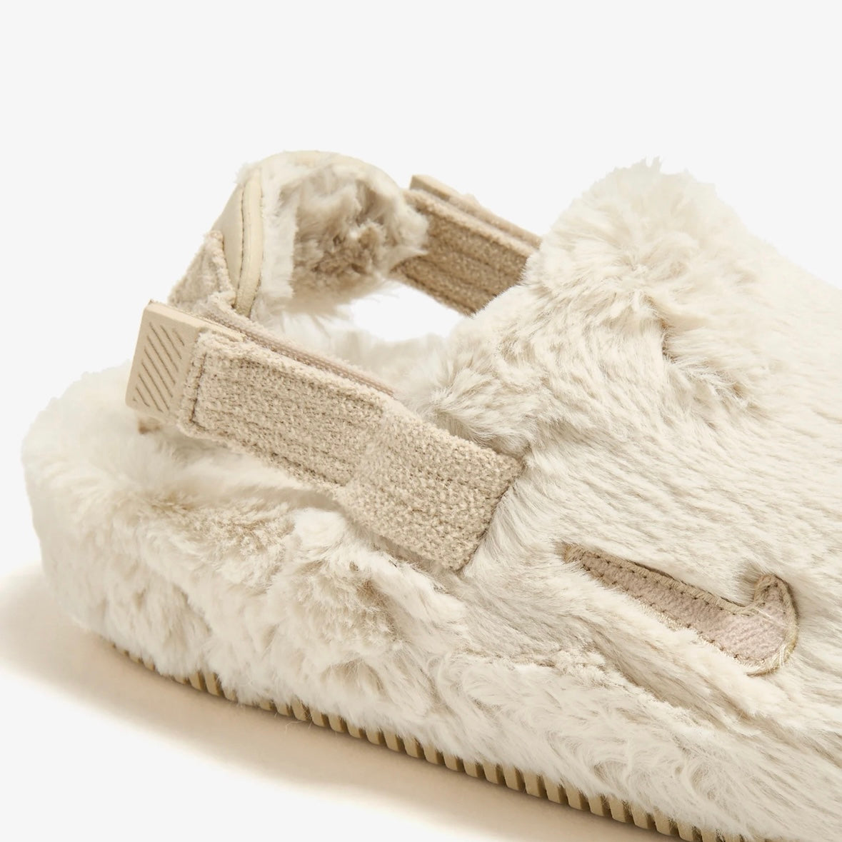 Nike Calm SE Mule Faux Fur